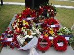 15. The floral tributes laid in honour of Billy Sing.